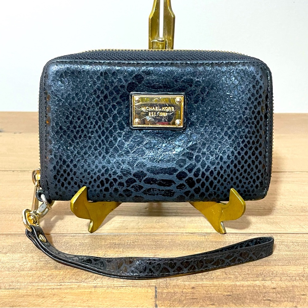 Michael Kors snakeskin embossed black wristlet with gold hardware